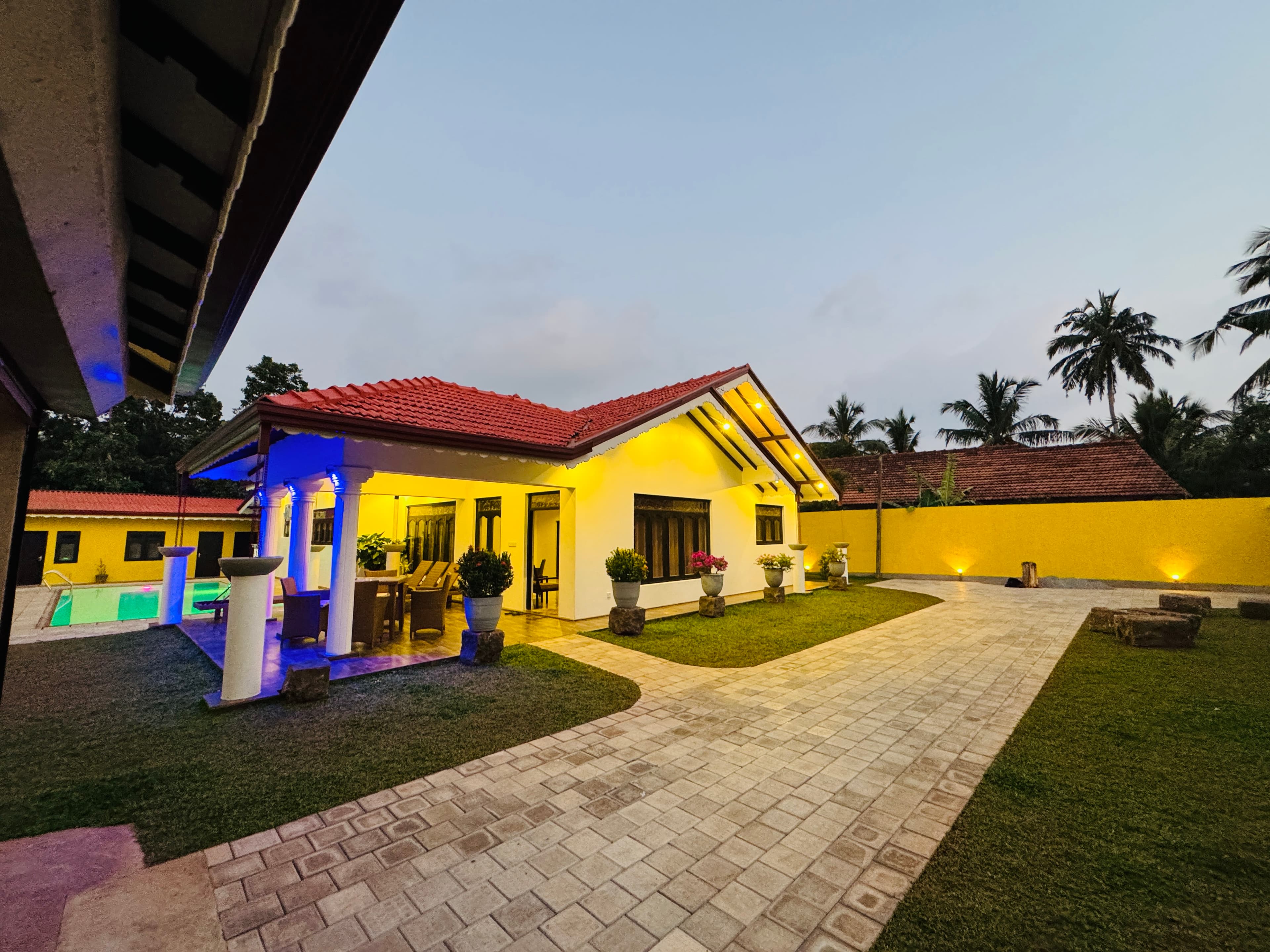 Villa illuminated at dusk